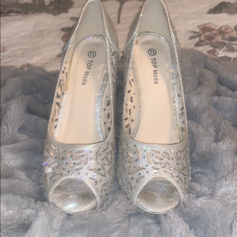 Open towed silver jeweled heels